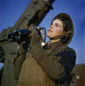 A member of the ATS (Auxiliary Territorial Service) serving as a spotter with a 3.7-inch anti-aircraft gun battery, December 1942 (Imperial War Museum: TR 452)