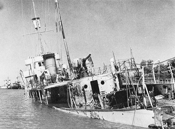 Iranian gunboat Babr after being shelled by the British Navy during the invasion of Iran, 25 August 1941 (Iranian govt photo, public domain)