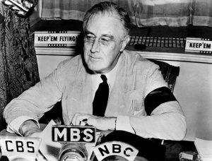 Franklin D. Roosevelt at the White House, delivering radio address, 11 September 1941. Note his black armband for his mother’s death four days before (US National Archives: 197058)