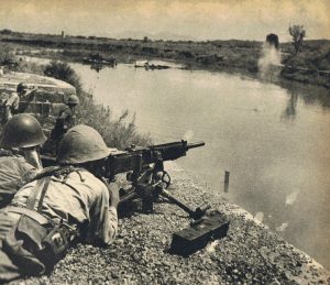 Soldiers of Japanese 4th Division man Type 92 heavy machine gun near Miluo River in China, Second Battle of Changsha, 22 or 23 Sep 1941 (public domain via Wikipedia)