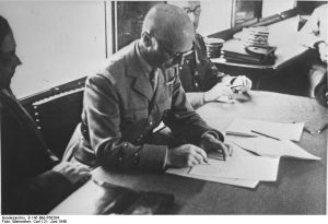 French Gen. Charles Huntziger signing the Franco-German armistice, Compiègne, France, 22 Jun 1940 (German Federal Archive: B 145 Bild-P50284)