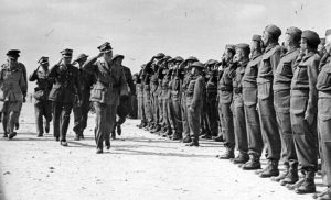 Gen. Sikorski reviewing Polish troops in Tobruk, Libya, November 1941 (public domain via Wikipedia)