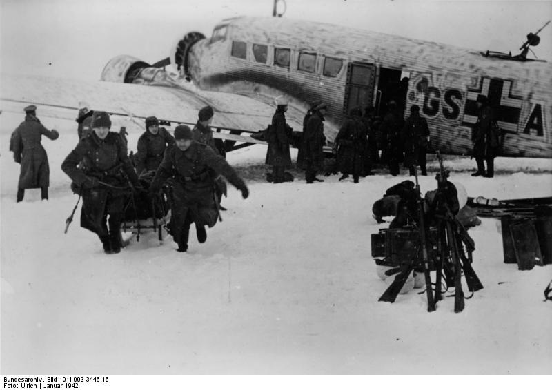 German troops in the Demyansk Pocket unloading supplies from a Ju 52 transport, Jan 1942 (German Federal Archive: Bild 101I-003-3446-16)