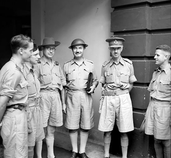 Lt. Gen. Arthur Percival meeting with war correspondents, Singapore, Jan 1942 (Imperial War Museum: 4700-50 FE 583)