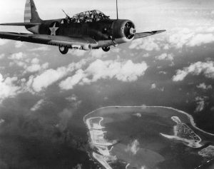 US Navy TBD-1 Devastator bomber over Wake Island during American attack, 24 Feb 1942 (US National Archives: 80-CF-1071-1)