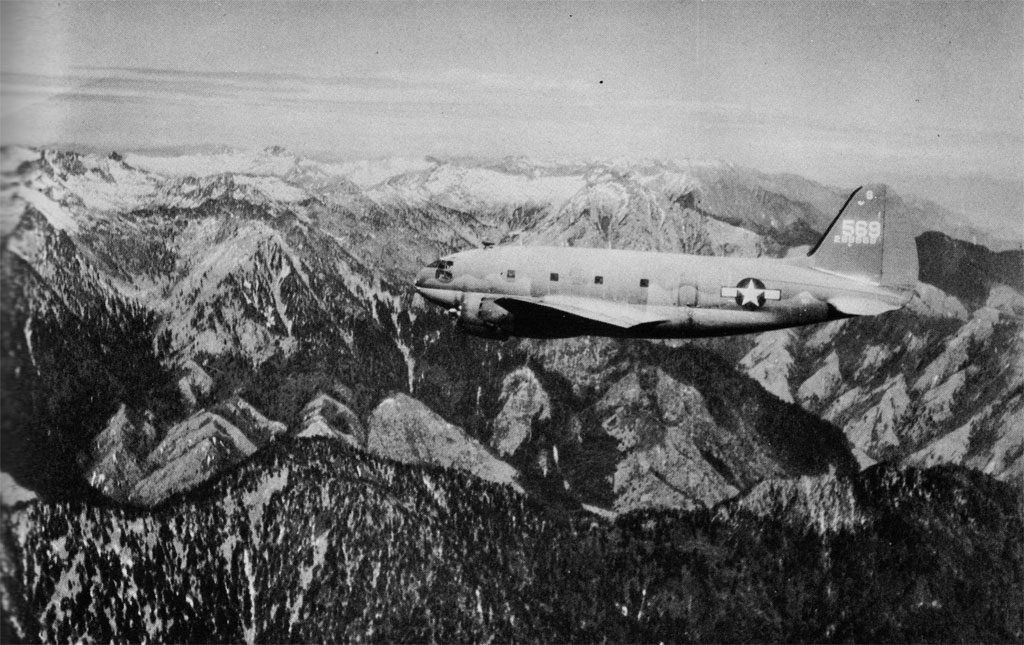 US C-46 Commando cargo plane flying over the “Hump” during World War II (US Army Air Forces photo)