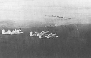 US Navy TBD-1 Devastators from USS Yorktown, prepare to attack Japanese shipping in the Huon Gulf, New Guinea, 10 March 1942 (US Navy photo)