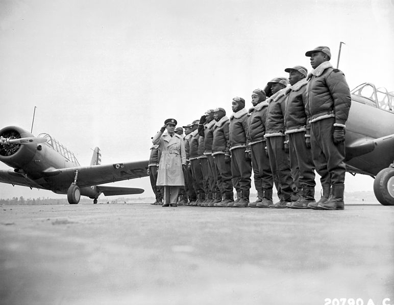 Maj James A. Ellison reviews first class of Tuskegee Airmen, returning the salute of Mac Ross, one of the first graduates, Tuskegee Army Air Field, AL, 1941 (US Air Force photo)