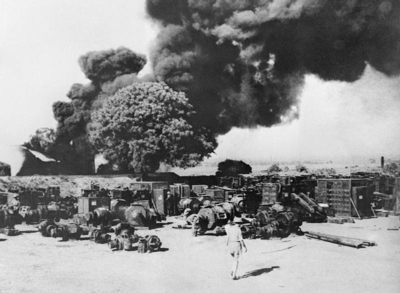 Yenangyaung oil fields being destroyed by retreating British troops, Burma, 15 Apr 1942 (Imperial War Museum: K 2204)