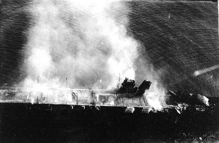 Japanese carrier Hiryu burning, photographed by a plane from Japanese carrier Hosho, 5 Jun 1942 (US Naval History and Heritage Command)