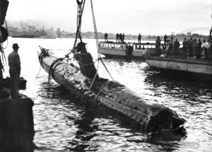 Japanese midget submarine raised from Sydney Harbor, Australia, the day after the attack, 1 Jun 1942 (Australian War Memorial: 060696)