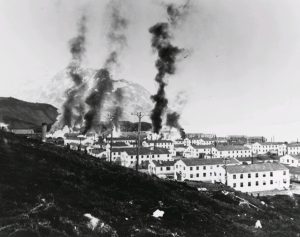 Buildings in Dutch Harbor, Alaska, in flames after Japanese strike, 3 Jun 1942 (US Army photo)