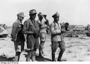 German Field Marshal Erwin Rommel observing the field near El Alamein, Egypt, 18 Jun 1942 (German Federal Archive: Bild 146-2002-010-05A)