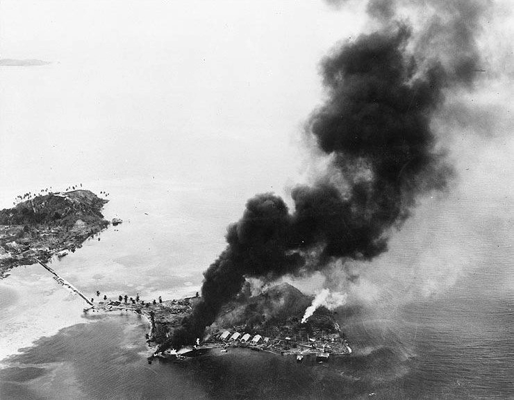 Japanese facilities on fire, Tanambogo Island, east of Tulagi, Solomon Islands, 7 Aug 1942 (US National Archives)