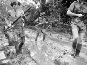 Australian troops at Milne Bay, New Guinea, shortly after the unsuccessful Japanese invasion attempt, 1 Oct 1942 (Australian War Memorial: 013335)