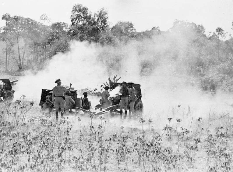 Uganda Battery of Kings African Rifles in action against the Vichy-held positions near Ambositra, Madagascar, September 1942 (Imperial War Museum: K 8588)