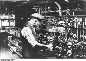 Belgian forced worker at Siemens factory in Berlin, August 1943. (German Federal Archives: Bild 183-R46093)