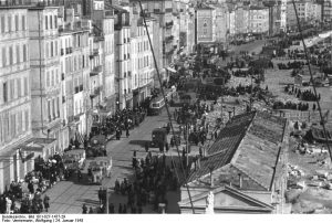 SS and French police round up Jews in the old quarter of Marseille, France, 24 Jan 1943 (German Federal Archive: Bild 101I-027-1477-29)