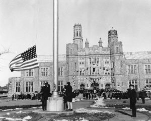 Raising the flag at US Naval Training Center, Hunter College, Bronx, NY, 8 Feb 1943 (US National Archives)