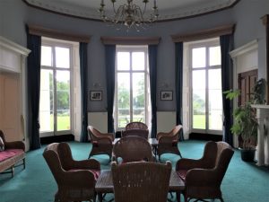 The sitting room at Southwick House, now called the "Ramsay Room," which lies between the library and the map room. Southwick House, England, September 2017 (Photo: Sarah Sundin)