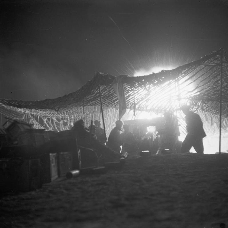 British field gun firing during the assault on the Mareth line, 30 March 1943 (Imperial War Museum)