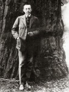 Sergei Rachmaninoff in the California redwoods, 1919 (public domain via Wikipedia)