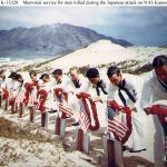 US Navy sailors honoring fellow sailors killed during the Pearl Harbor attack, Naval Air Station Kaneohe, Oahu, 30 May 1942 (US National Archives)