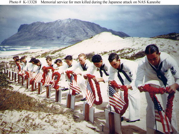 US Navy sailors honoring fellow sailors killed during the Pearl Harbor attack, Naval Air Station Kaneohe, Oahu, 30 May 1942 (US National Archives)