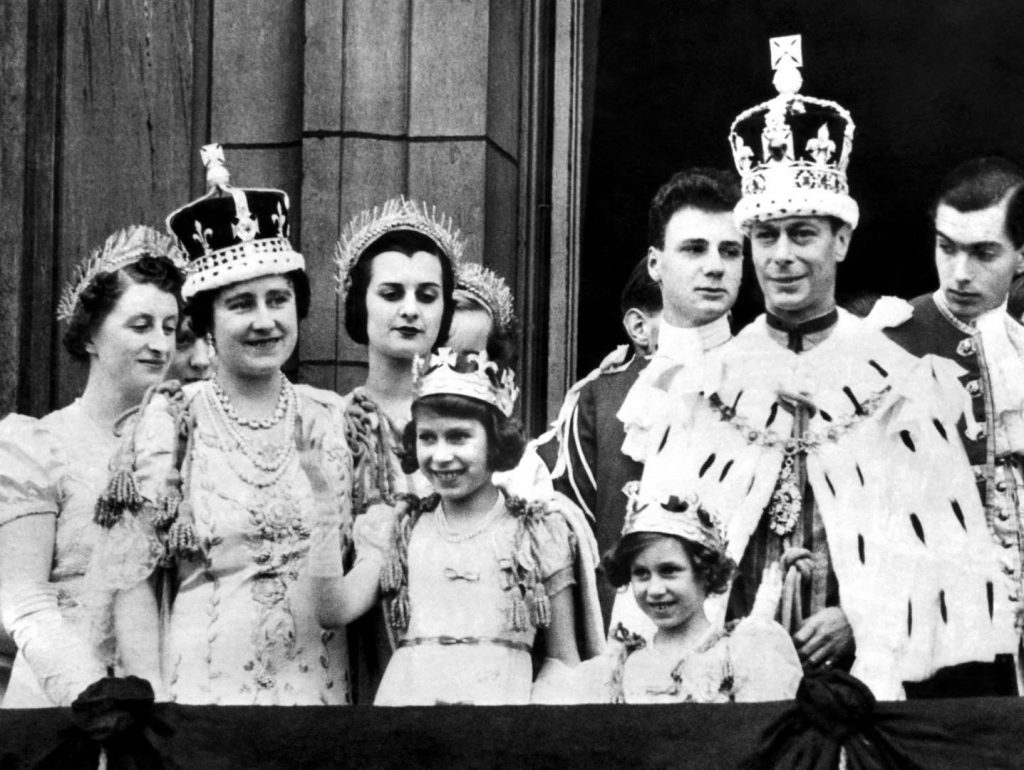King George VI, Queen Elizabeth, and Princesses Elizabeth and Margaret at Buckingham Palace on the king’s coronation day, London, 12 May 1937 (United Kingdom National Archives)