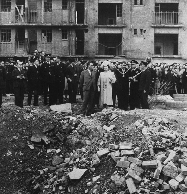 King George VI and Queen Elizabeth visit the East End, the site of the last V-2 to fall on London on 27 Mar 1945, visiting on 4 Oct 1945 (United Kingdom National Archives)