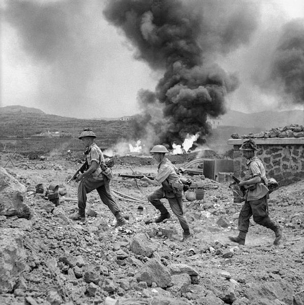 Troops of Britain’s Duke of Wellington’s Regiment advancing on Pantelleria, 17 Jun 1943 (Imperial War Museum)