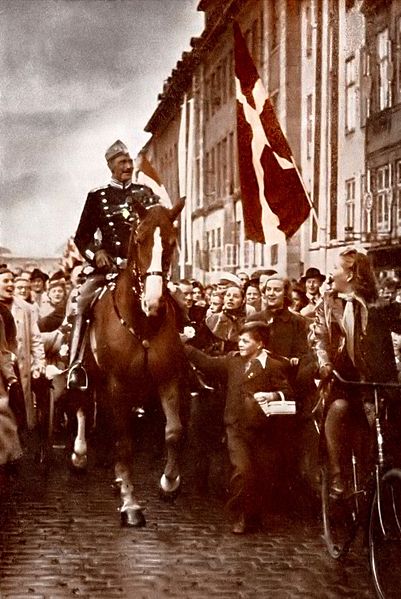 King Christian X riding through Copenhagen on his 70th birthday, 26 September 1940 during the German occupation of Denmark (public domain via Wikipedia)