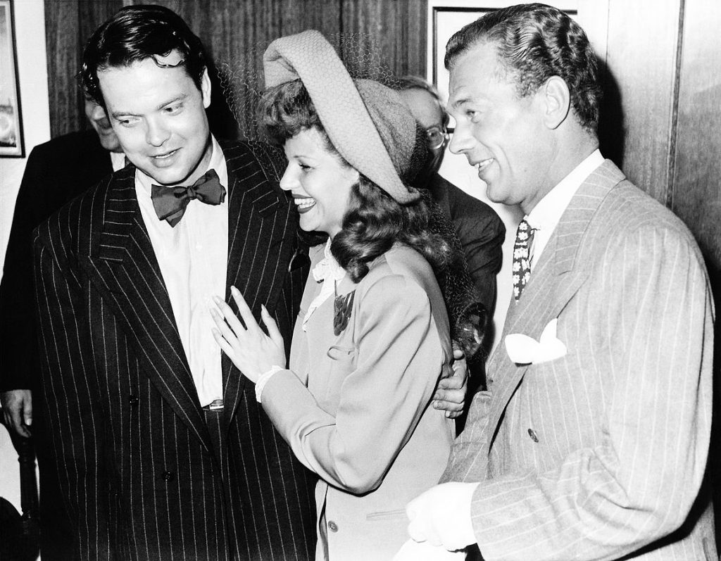 Wedding of Orson Welles and Rita Hayworth, with Joseph Cotten as best man, Santa Monica, CA, 7 September 1943 (International News Photo, public domain via Wikipedia)