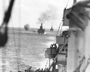 USS Minneapolis, USS San Francisco, and USS New Orleans bombard Wake Island, 5 Oct 1943 (US National Archives)