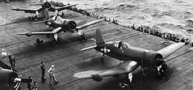 F4U-2 night-fighter Corsairs equipped with air intercept radar aboard carrier USS Intrepid in the Marshall Islands, 1944—see radome in right outer wing (US Navy photo)