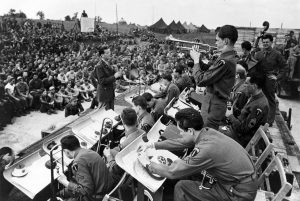 Maj. Glenn Miller and his Army Air Force band in an open-air concert, WWII (USAF Photo)