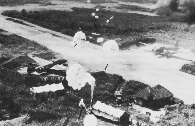 Low-flying US bombers dropping parachute bombs on Vunakanau airfield at Rabaul, 1943 (US Army Center of Military History)