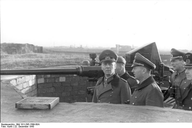 Field Marshal Rommel and Luftwaffe Lt. Gen. Rupprecht inspecting artillery position, Dunkirk, France, 22 Dec 1943 (German Federal Archive: Bild 101I-295-1599-08A)