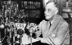 Pres. Franklin Roosevelt at his home in Hyde Park, NY, delivering a Fireside Chat, 24 Dec 1943 (US National Archives)