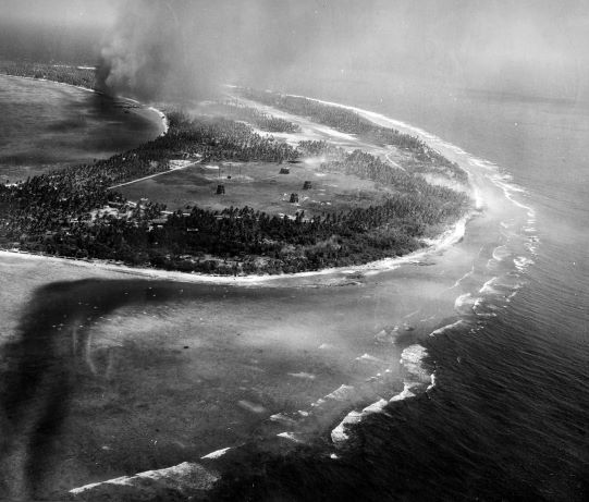 Strike photo of Kwajalein, Marshall Islands taken by aircraft from USS Enterprise, 30 Jan 1944 (US National Museum of Naval Aviation)