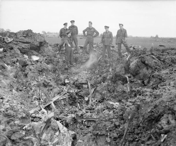 Air Marshal Sir Roderick Hill is shown the wreckage of a German Junkers Ju 188 bomber shot down by the RAF over Essex on the night of 21 March 1944 (Imperial War Museum CH 12537)
