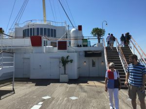 Promenade deck of the Queen Mary, stairs up to the sun deck. Long Beach, CA, June 2017 (Photo: Sarah Sundin)