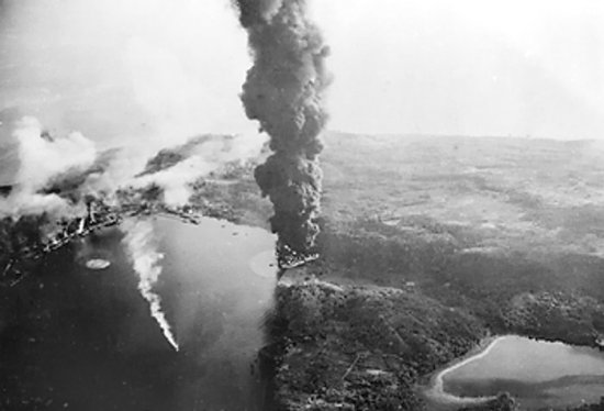 Japanese ships and harbor facilities after Allied carrier strike on Sabang, Sumatra, 19 Apr 1944 (Imperial War Museum: 4700-01 A 23249)
