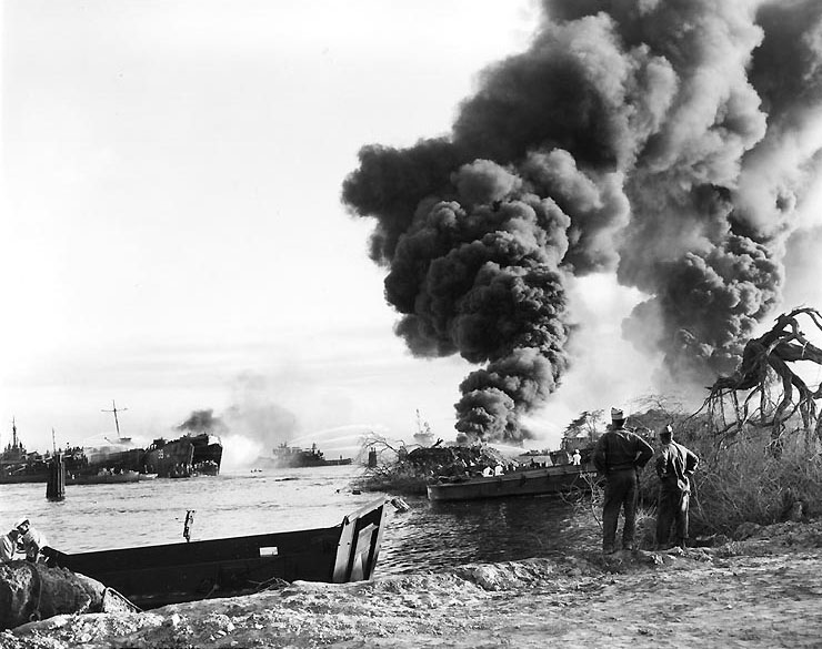 Sailors fighting fires on USS LST-480 resulting from explosion of LST-353 the previous day, Pearl Harbor, Territory of Hawaii, 22 May 1944 (US National Archives)