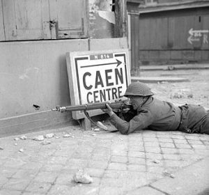 British soldier in Caen, France, 9 July 1944 (Imperial War Museum)
