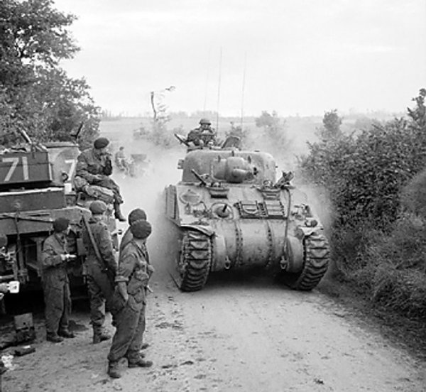 British Sherman tanks in the assault on Caen, France, 8 July 1944 (Imperial War Museum: 4700-29 B 6642)