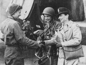 Flight nurses Lt. Suella Bernard and Lt. Foster, the first nurses to evacuate the wounded from Normandy to England. (US National Archives)