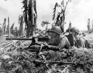 US Marines Gunnery Sergeant J. Paget and Privates L.C. Whether and V.A. Sot, Guam, 28 July 1944 (US National Archives)
