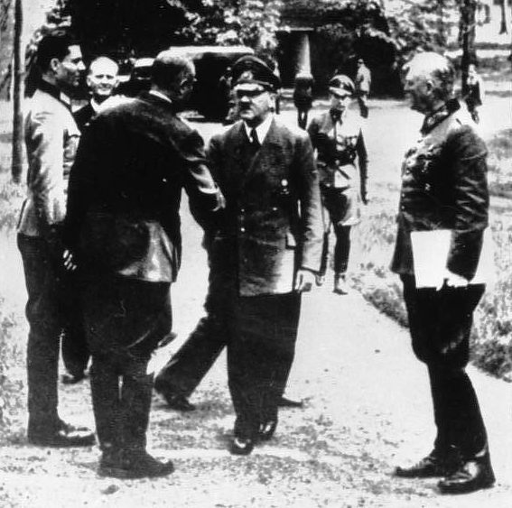 Col. Count Claus von Stauffenberg and Adm. Karl-Jesco von Puttkamer greet Hitler at Rastenburg, 15 July 1944, 5 days before assassination attempt. (German Federal Archive: Bild 146-1984-079-02)