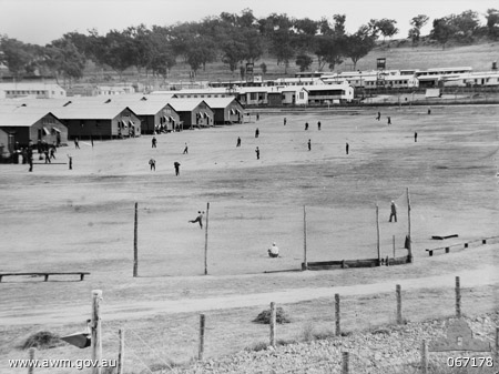 Japanese prisoners of war practicing baseball at No.12 Prisoner of War compound near Cowra, NSW, Australia, 1 Jul 1944 (Australian War Memorial: 067168)